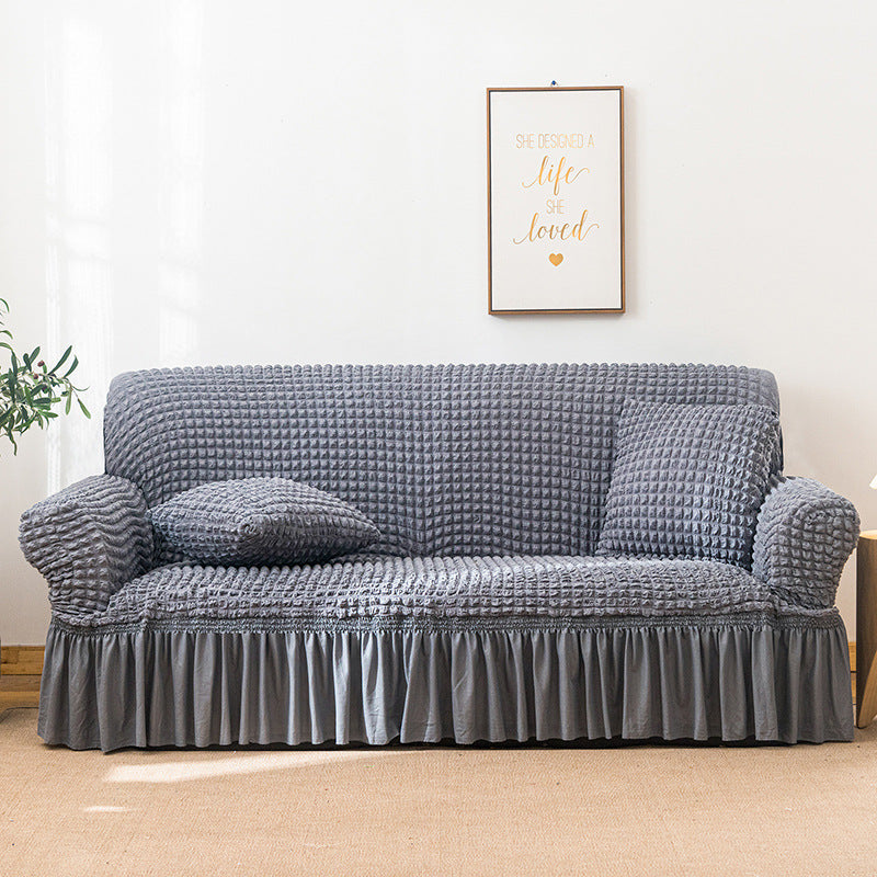 🛋️ 50% RABATT! 🎄 Universeller Sofabezug mit Rüschenrock – Dehnbar, rutschfest & perfekt für Weihnachten und den täglichen Schutz ✨