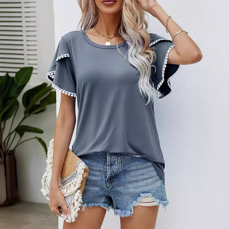 Lässiges Damen-T-Shirt mit Rundhalsausschnitt und Ärmeln mit Bommelbesatz